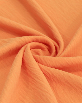 Tecido Crepe Duna Laranja Claro