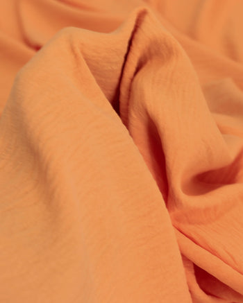 Tecido Crepe Duna Laranja Claro