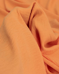 Tecido Crepe Duna Laranja Claro