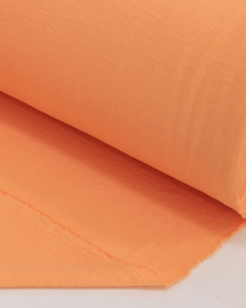 Tecido Crepe Duna Laranja Claro