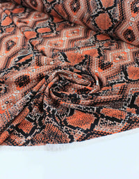 Tecido Crepe Bubble Étnico Coral e Preto